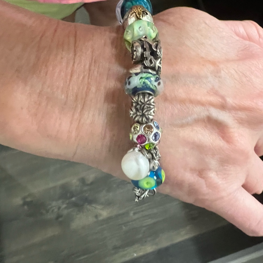 Silver authentic TROLL AND TROLL BEADS with Troll lock and all beach and sea bea